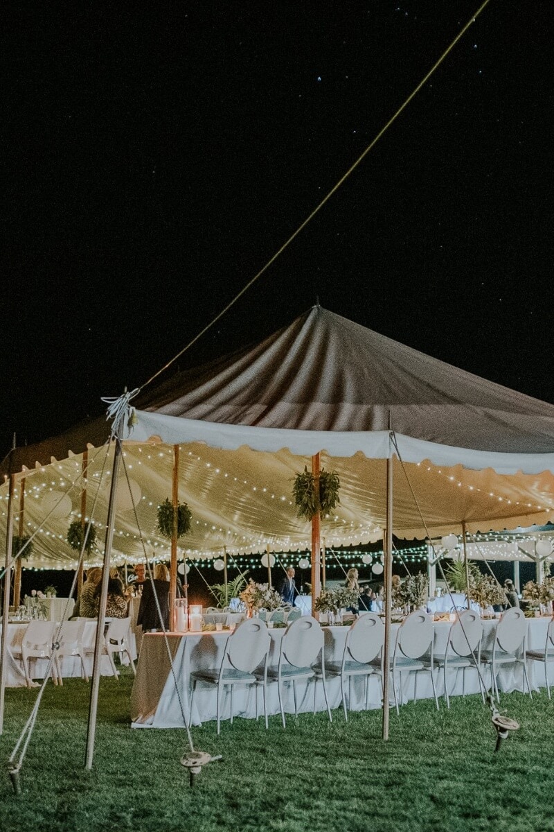 Marquee set up for wedding reception under the night sky