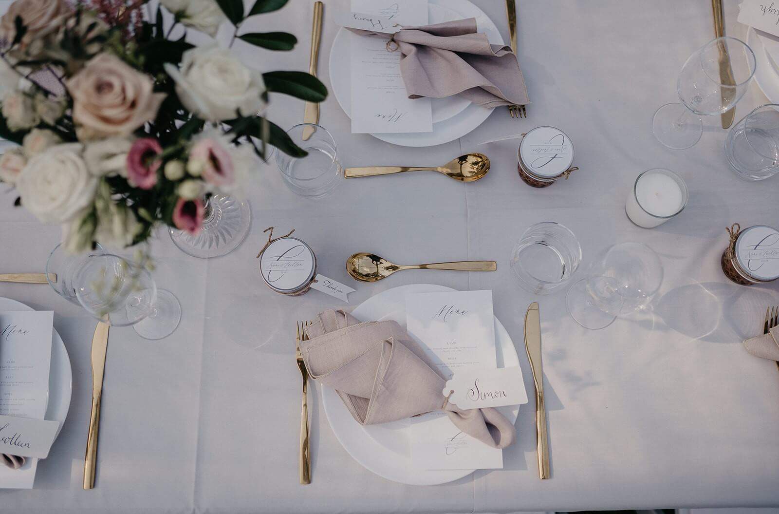 Tableware setup for wedding reception in blush and gold colours